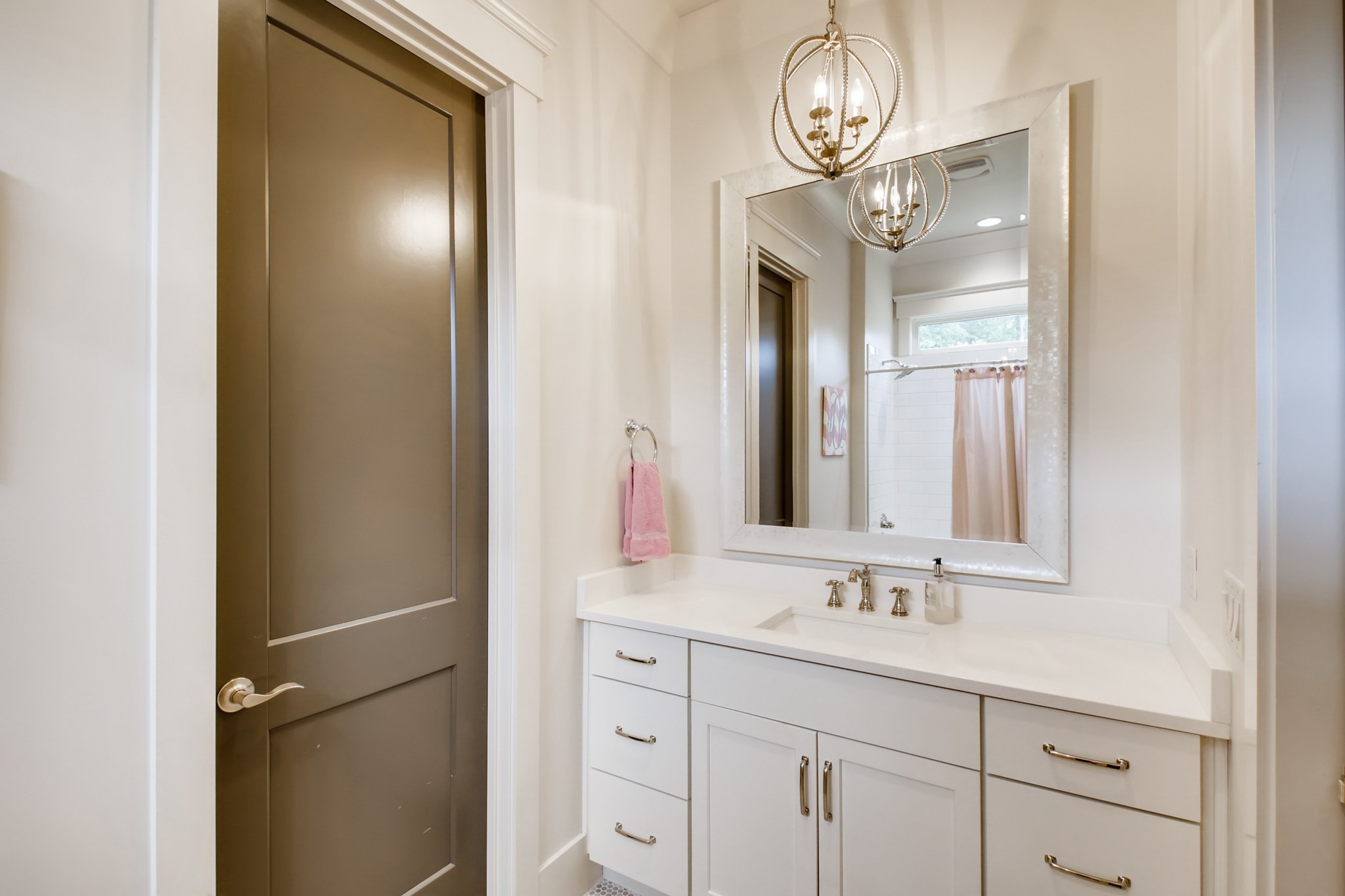 637 Legends Crest Drive Franklin, TN 37069 - Photo 31 of 50 a bathroom with a sink a mirror and a light fixture