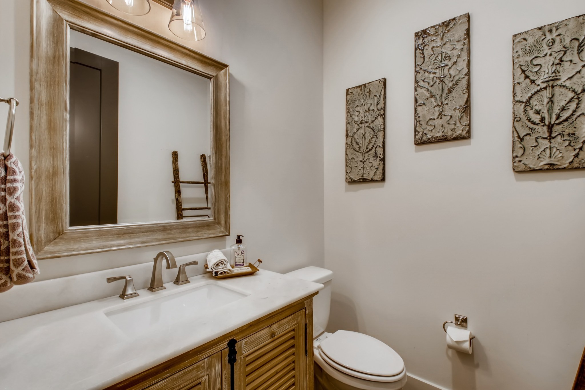 637 Legends Crest Drive Franklin, TN 37069 - Photo 32 of 50 a bathroom with a granite countertop toilet sink and mirror