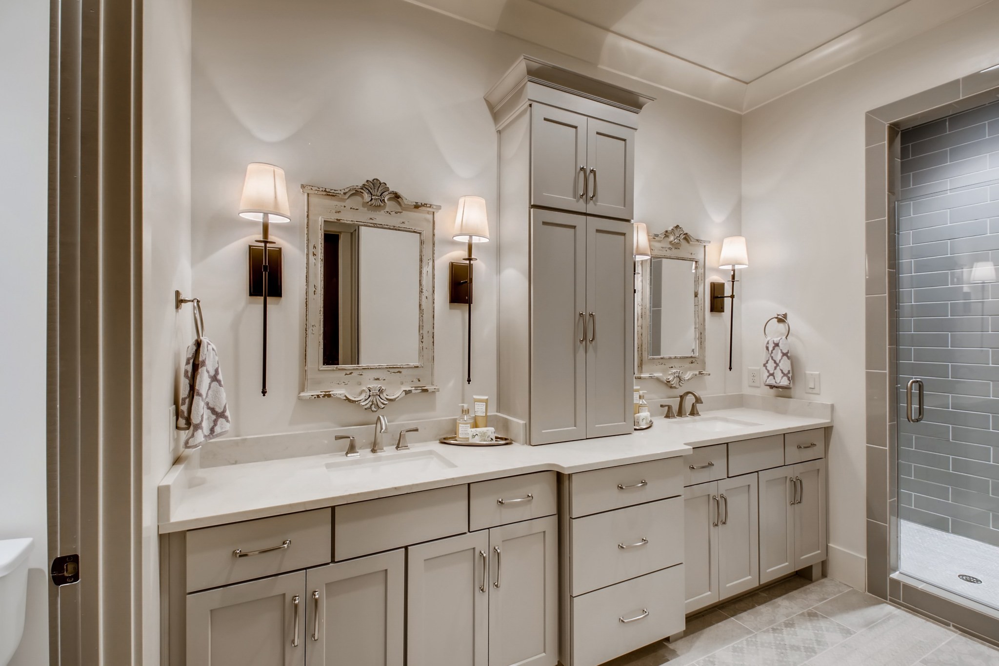 637 Legends Crest Drive Franklin, TN 37069 - Photo 34 of 50 a bathroom with a double vanity sink and mirror