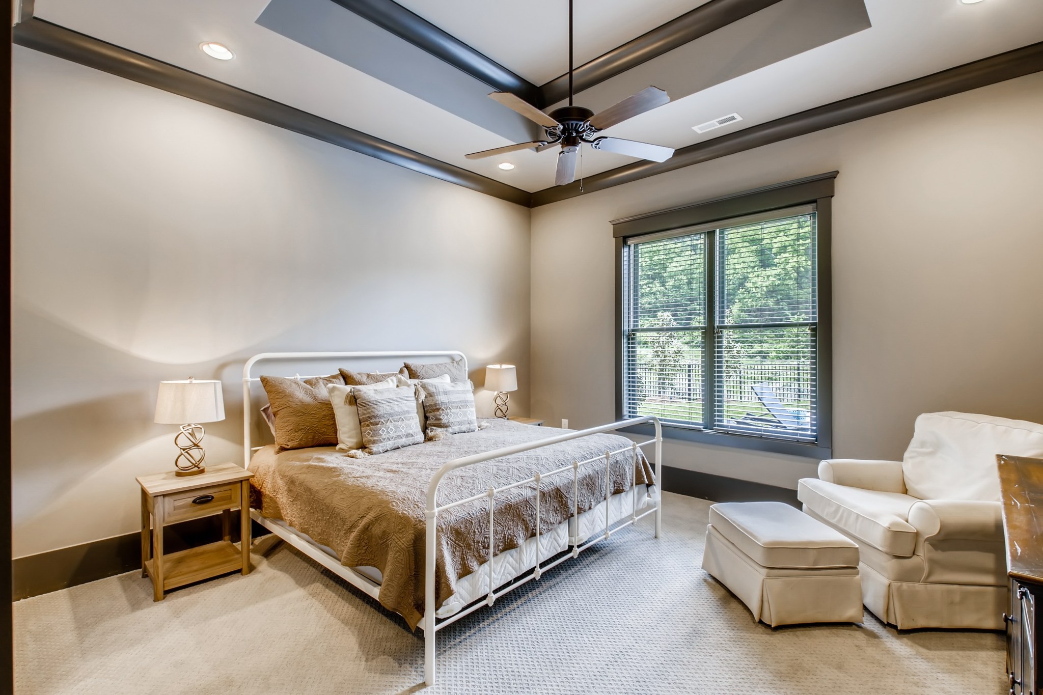 637 Legends Crest Drive Franklin, TN 37069 - Photo 37 of 50 a bedroom with a bed couch and window