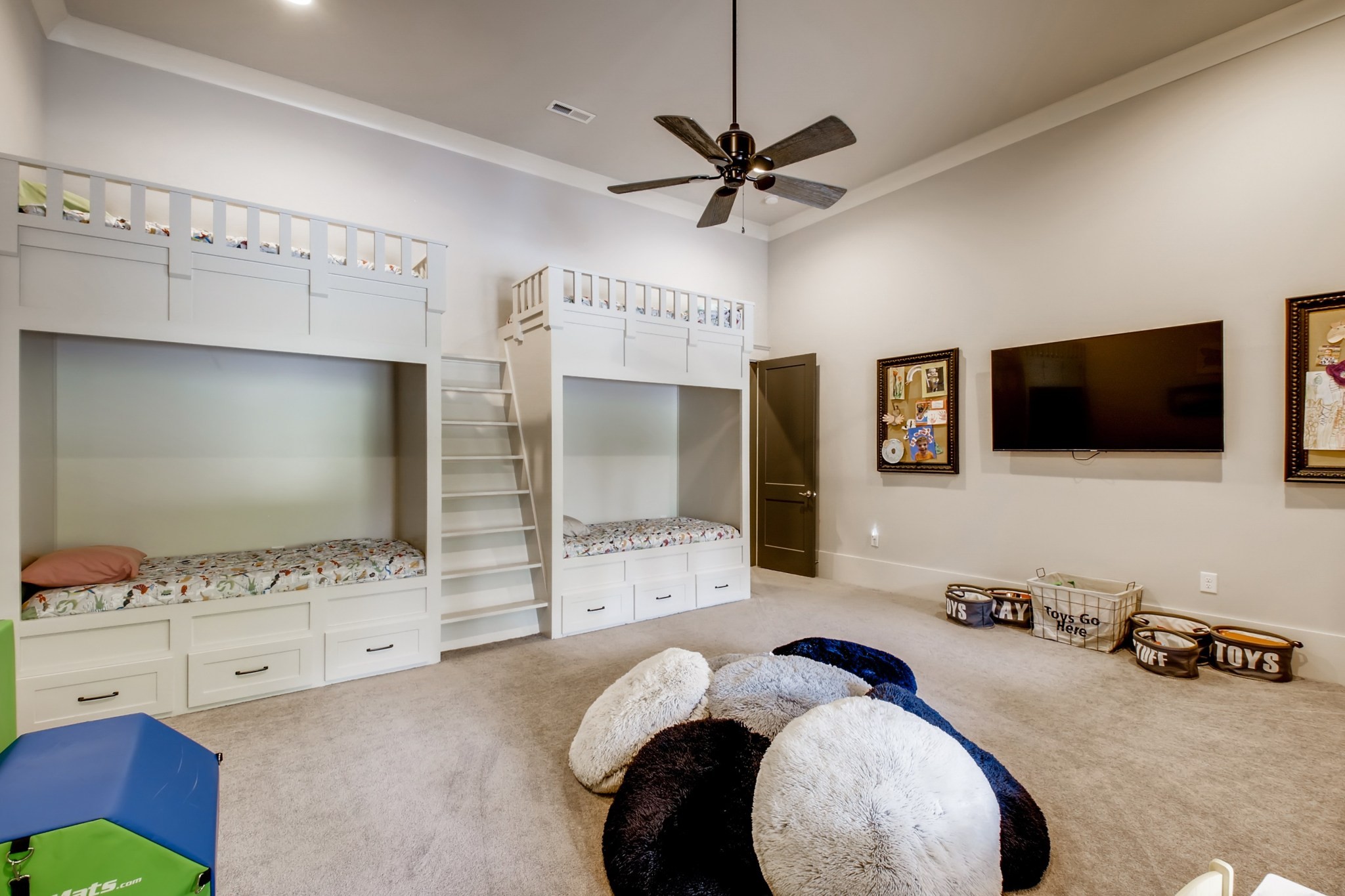 637 Legends Crest Drive Franklin, TN 37069 - Photo 39 of 50 a spacious bedroom with a bed and a flat screen tv