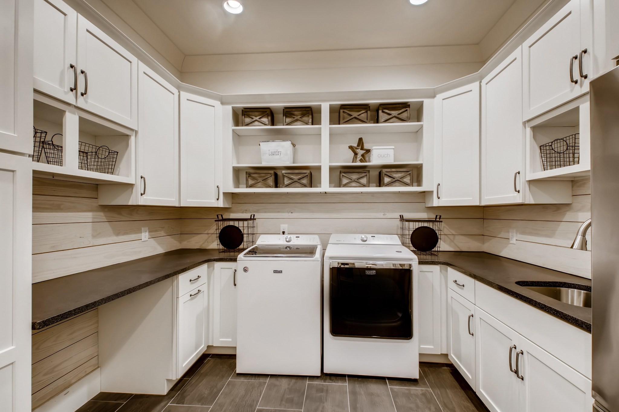 637 Legends Crest Drive Franklin, TN 37069 - Photo 43 of 50 a kitchen with stainless steel appliances granite countertop a stove and a sink