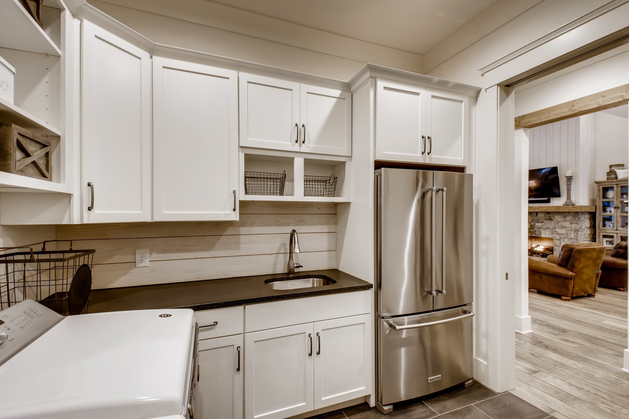 637 Legends Crest Drive Franklin, TN 37069 - Photo 44 of 50 a kitchen with stainless steel appliances a refrigerator sink and cabinets