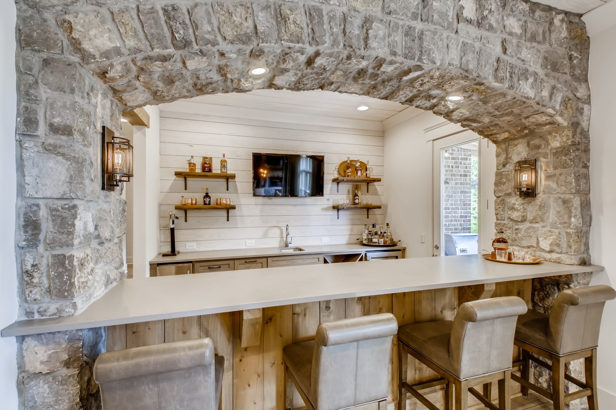 637 Legends Crest Drive Franklin, TN 37069 - Photo 45 of 50 a kitchen with a sink and chairs