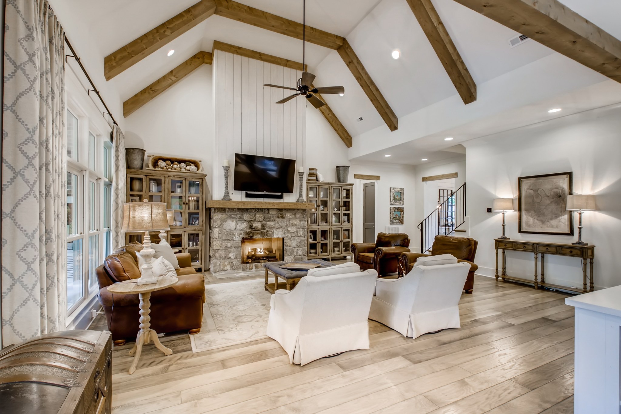 637 Legends Crest Drive Franklin, TN 37069 - Photo 8 of 50 a living room with furniture a flat screen tv and kitchen view