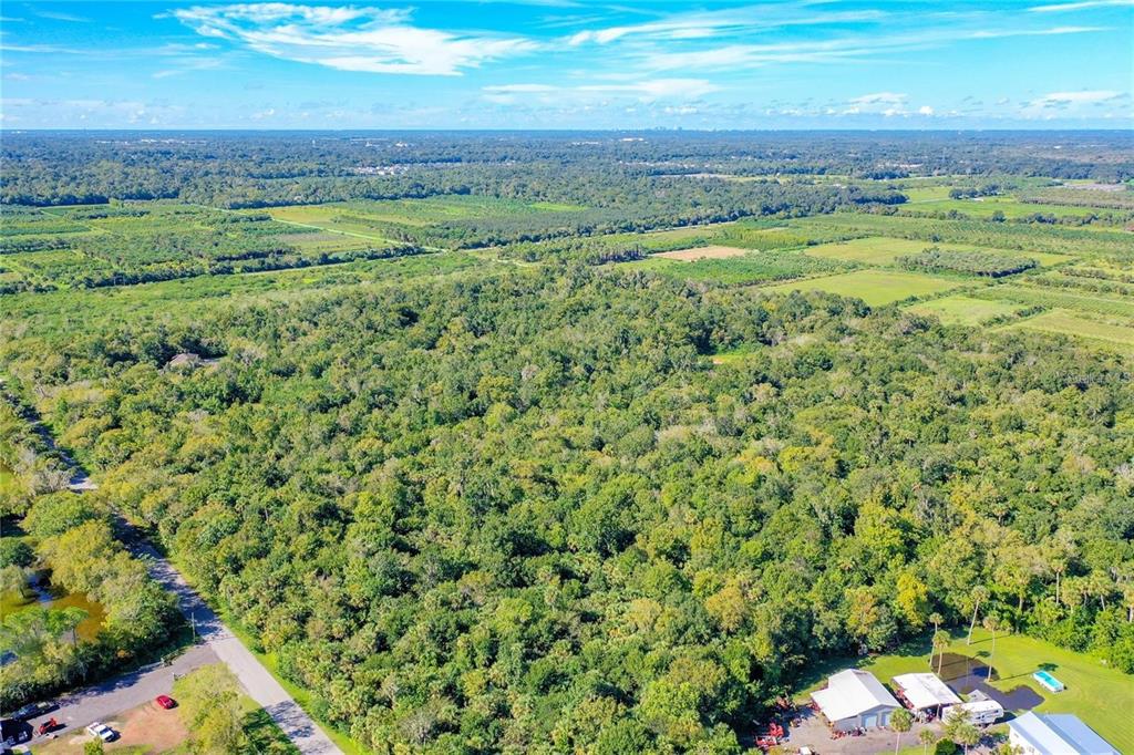 Elm Street Oviedo, FL 32765 - Photo 11 of 16 a view of a field with an outdoor space