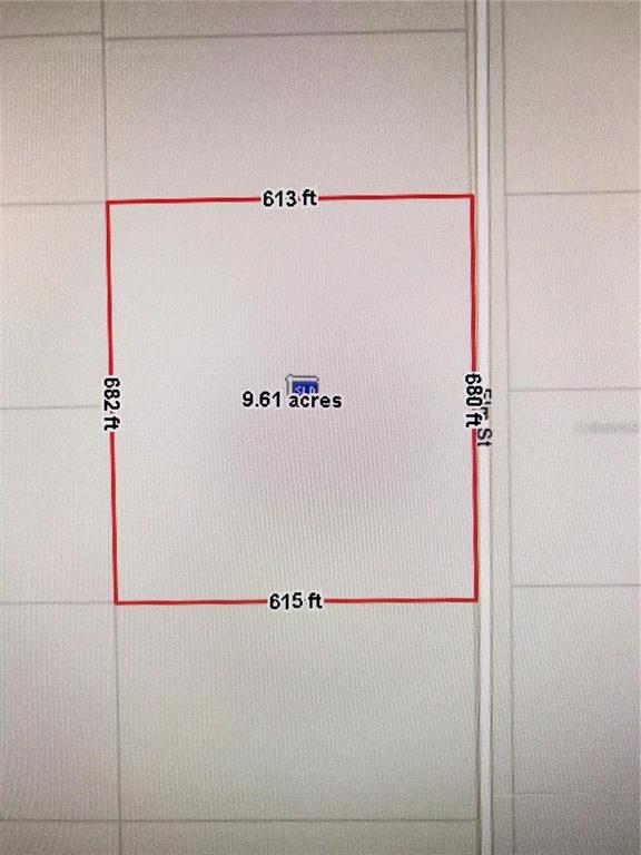 Elm Street Oviedo, FL 32765 - Photo 6 of 16 a white refrigerator freezer and a stove sitting inside of a kitchen