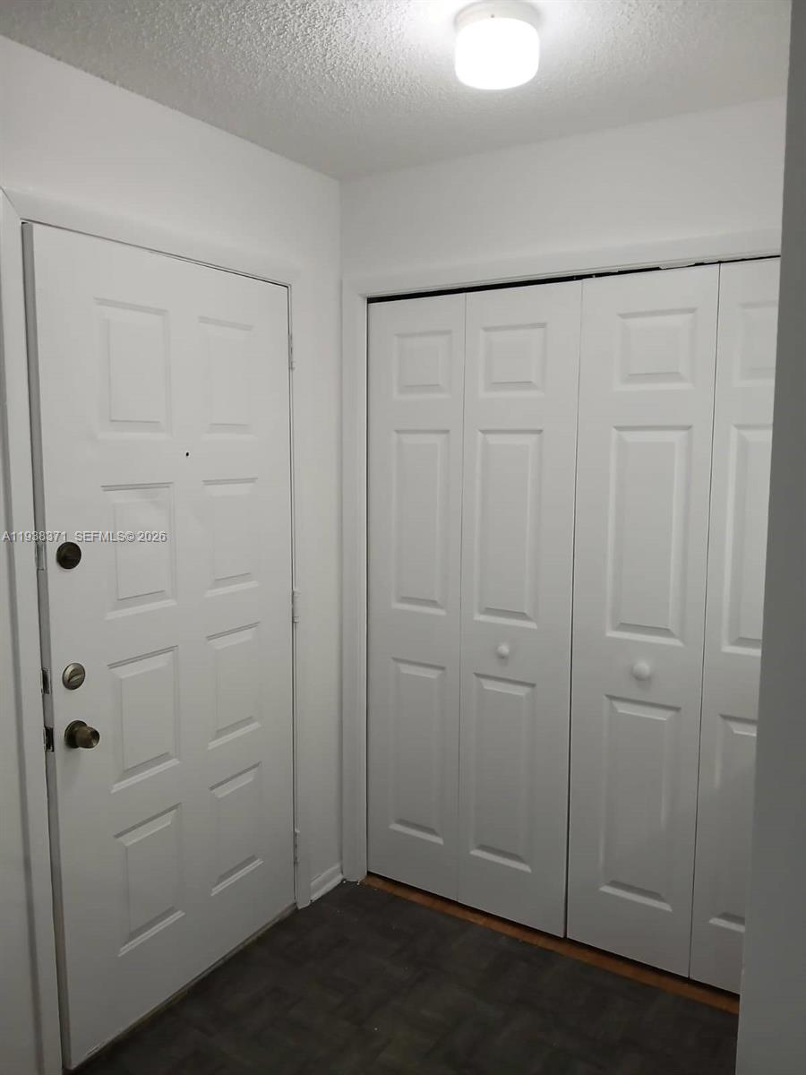 4521 West McNab Road, Unit 21 Pompano Beach, FL 33069 - Photo 12 of 18 a view of an empty room