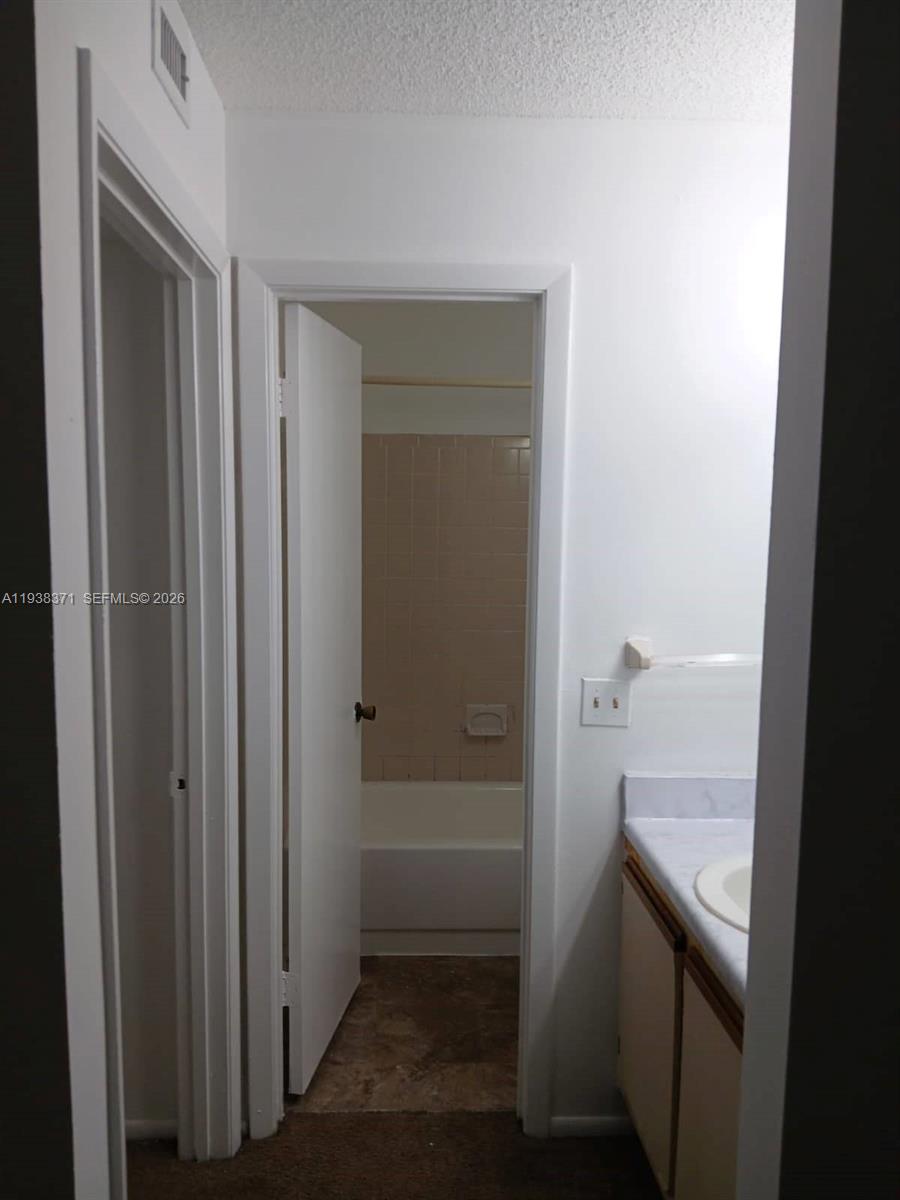 4521 West McNab Road, Unit 21 Pompano Beach, FL 33069 - Photo 14 of 18 a bathroom with a shower
