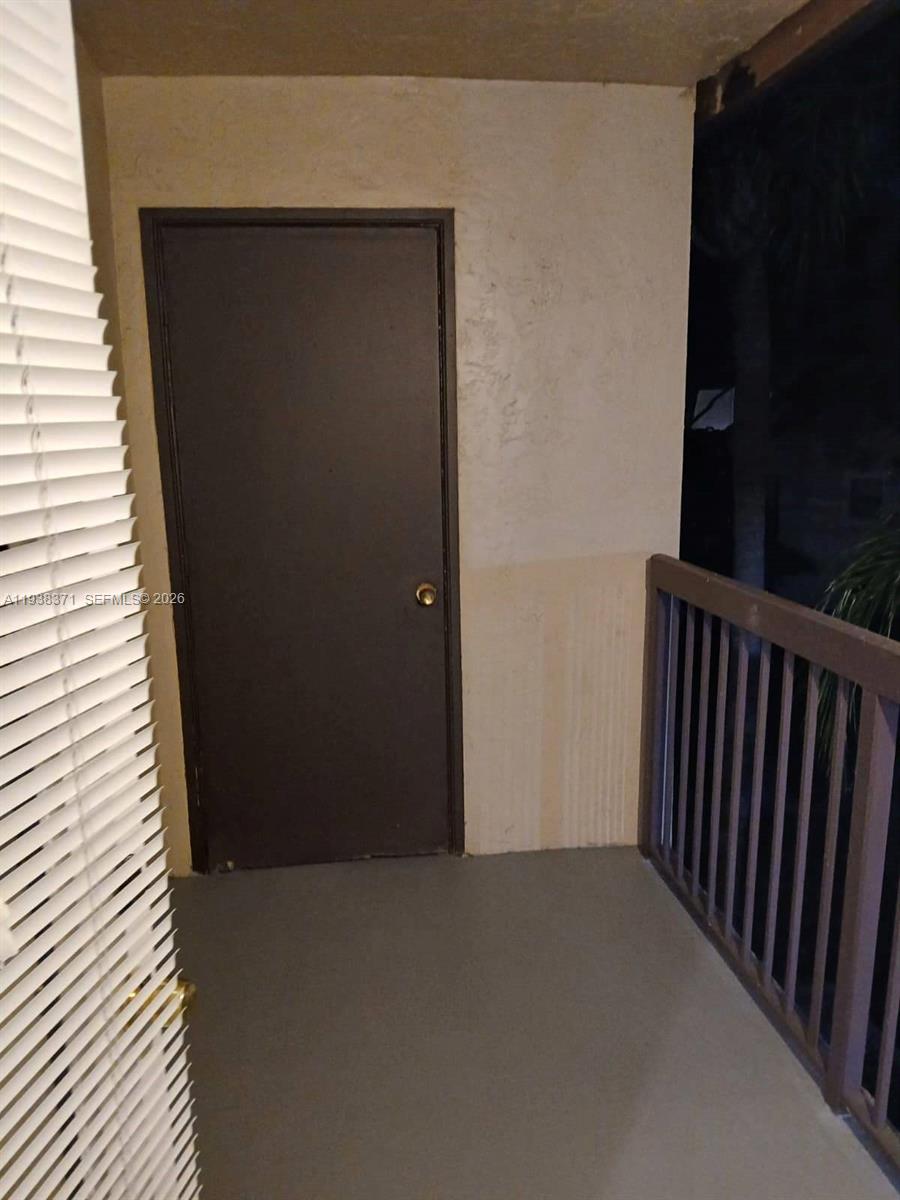 4521 West McNab Road, Unit 21 Pompano Beach, FL 33069 - Photo 2 of 18 a view of a balcony