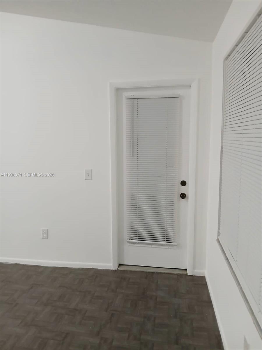 4521 West McNab Road, Unit 21 Pompano Beach, FL 33069 - Photo 8 of 18 a view of an empty room