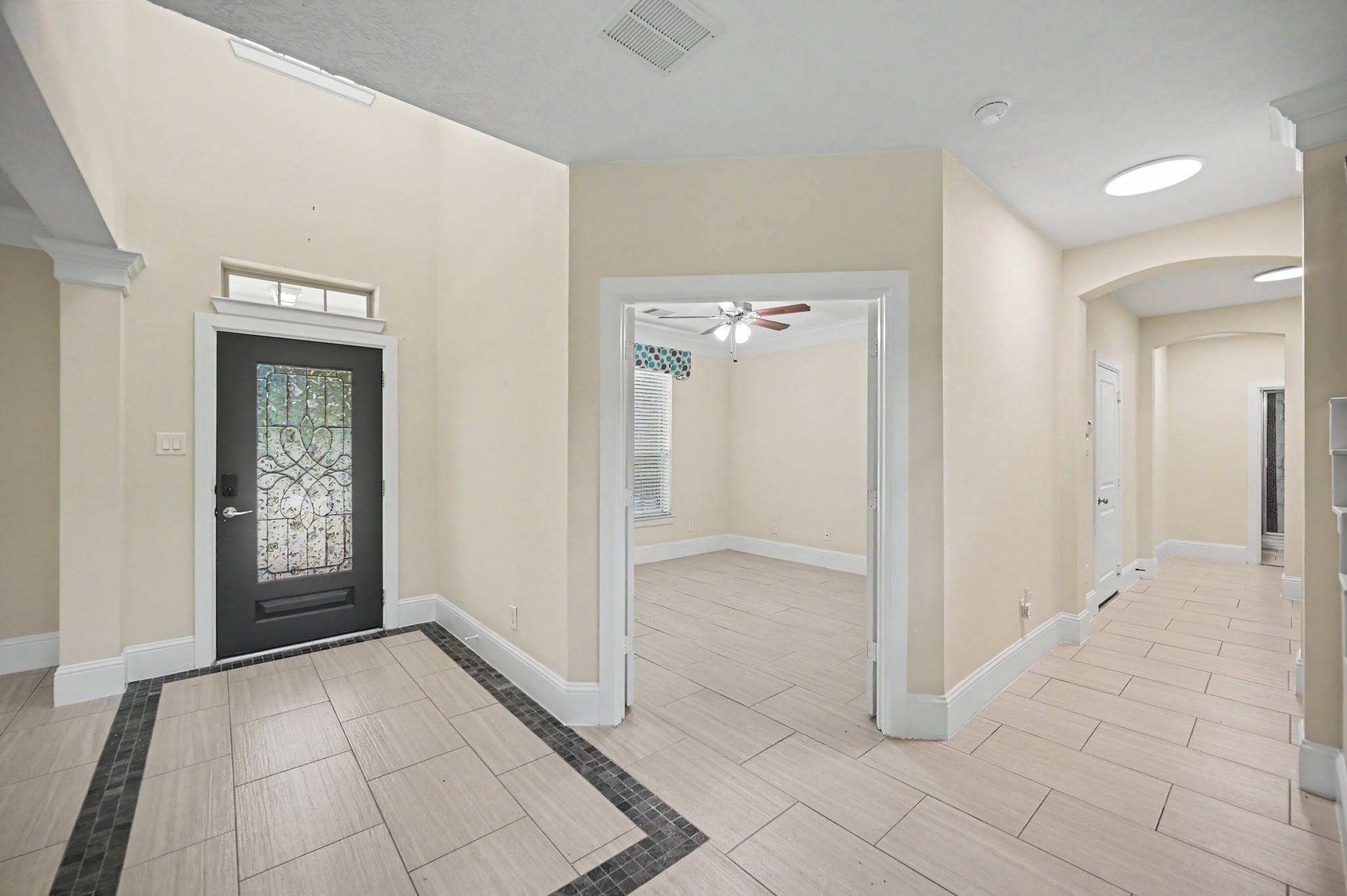 31325 Riley Woods Court Spring, TX 77386 - Photo 8 of 50 Welcoming front entry with a direct view into the private home office, thoughtfully positioned near the front of the home.