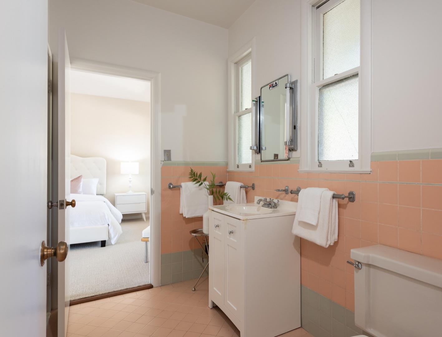 860 Longview Road Hillsborough, CA 94010 - Photo 25 of 42 a bathroom with a sink toilet and mirror