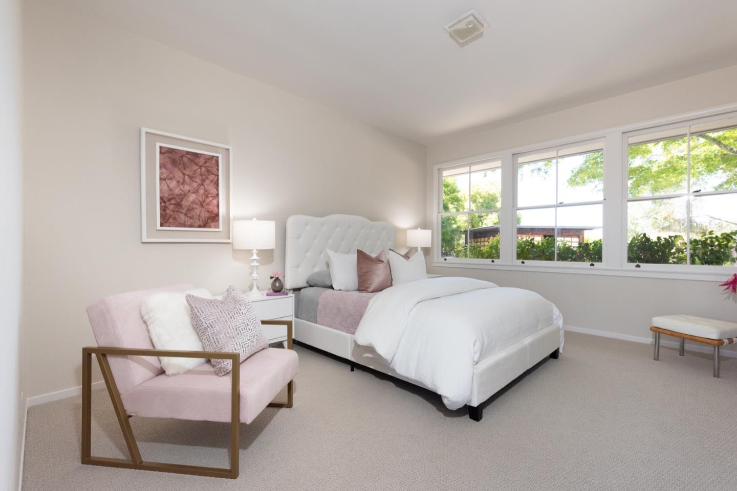 860 Longview Road Hillsborough, CA 94010 - Photo 27 of 42 a bedroom with bed and a large window