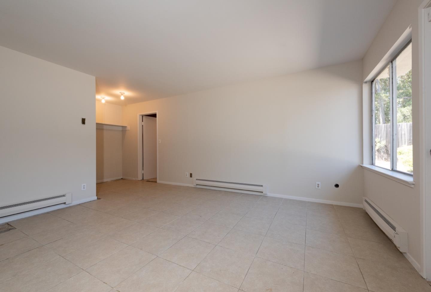 860 Longview Road Hillsborough, CA 94010 - Photo 32 of 42 an empty room with a window