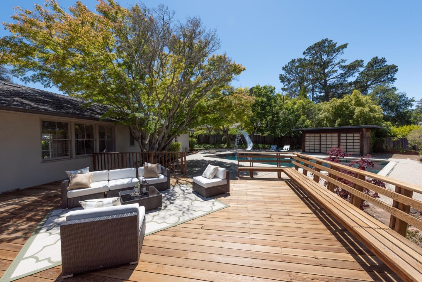 860 Longview Road Hillsborough, CA 94010 - Photo 39 of 42 a view of a roof deck with couches and potted plants