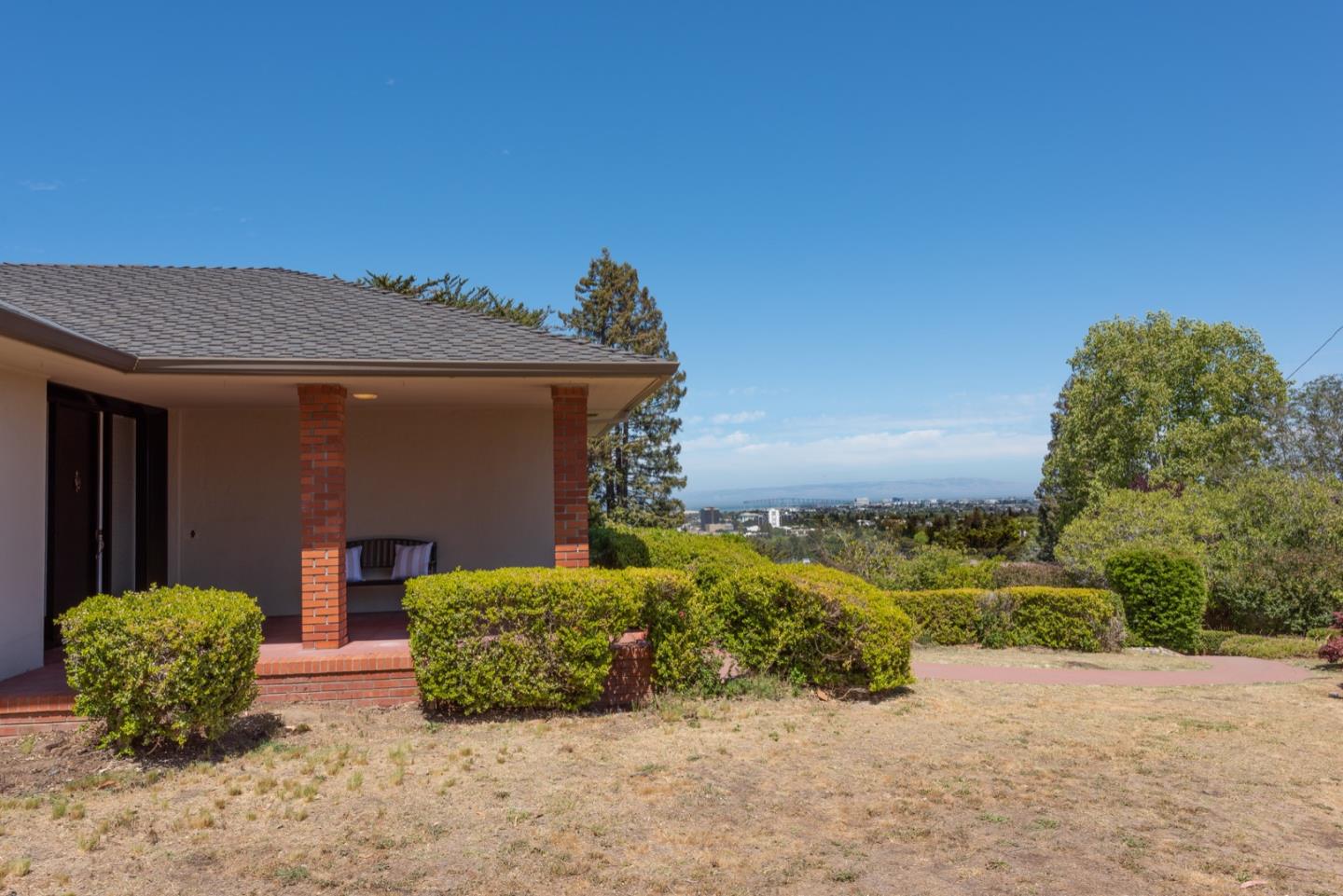 860 Longview Road Hillsborough, CA 94010 - Photo 40 of 42 a view of a house with potted plants