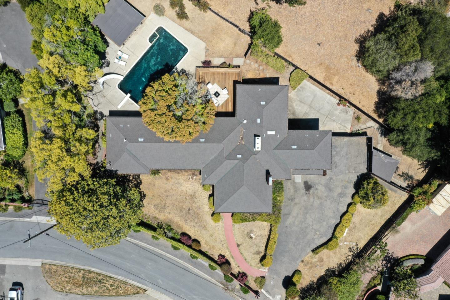 860 Longview Road Hillsborough, CA 94010 - Photo 4 of 42 an aerial view of a house with a yard and large trees
