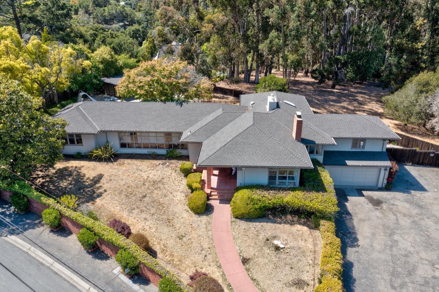 860 Longview Road Hillsborough, CA 94010 - Photo 41 of 42 an aerial view of a house with a yard basket ball court and outdoor seating