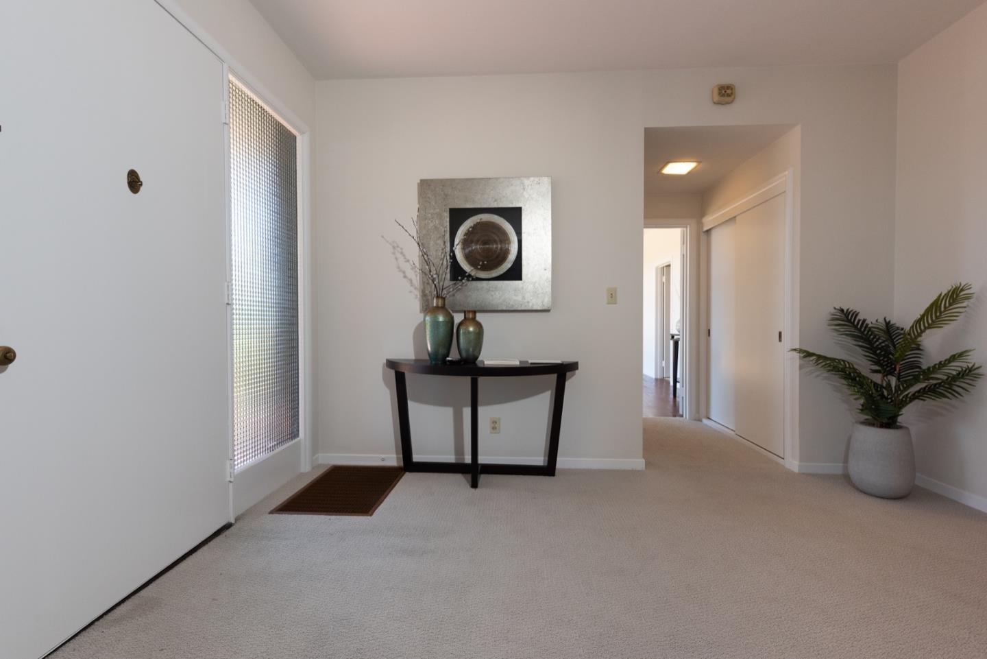 860 Longview Road Hillsborough, CA 94010 - Photo 7 of 42 a view of a hallway with seating area