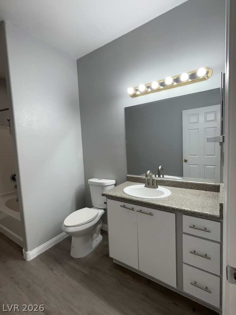 4915 East Russell Road, Unit 115 Las Vegas, NV 89120 - Photo 6 of 7 This bathroom features a contemporary vanity and a tub, ideal for unwinding after a long day.