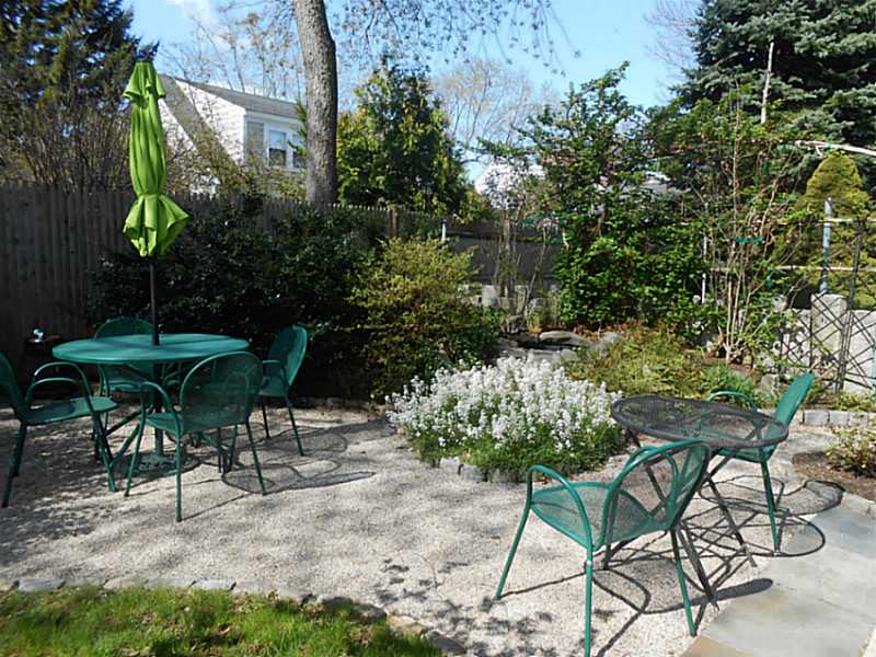 42 Scott Street, Unit 2 Pawtucket, RI 02860 - Photo 3 of 25 Patio/Deck. Tucked behind lovely plantings is a tranquil water feature