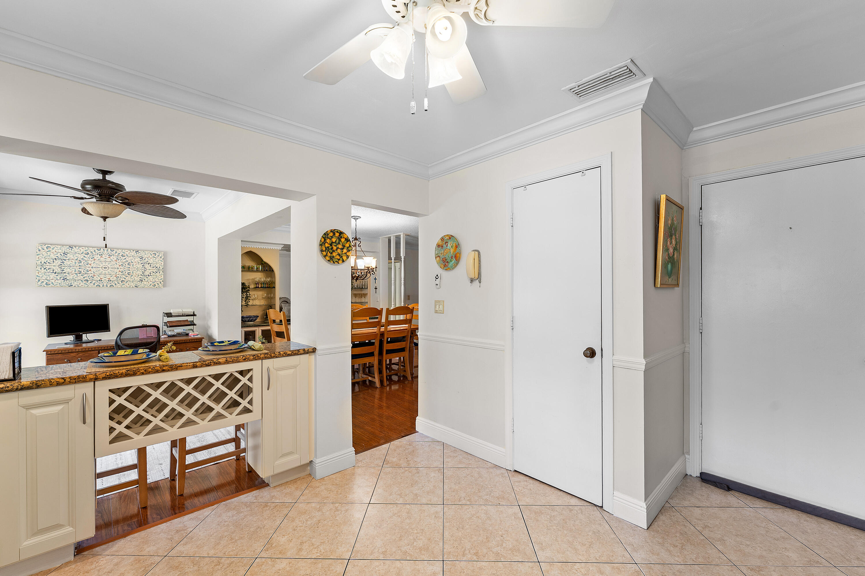 4863 Hawkwood Road, Unit B Boynton Beach, FL 33436 - Photo 7 of 16 Kitchen to Florida Room