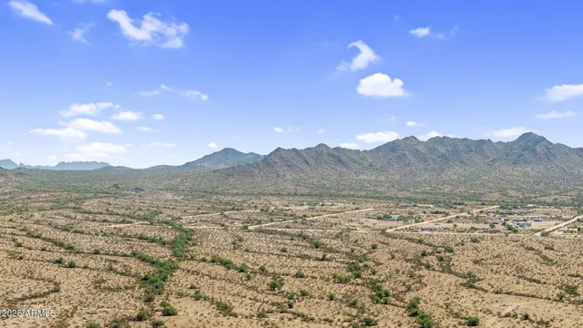 a view of mountain with lake view