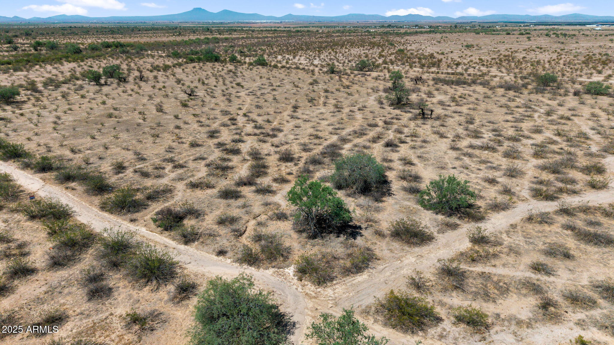 0 Peace Pipe Road, Unit 23 Maricopa, AZ 85138 - Photo 13 of 25 a view of an outdoor space with a lake view