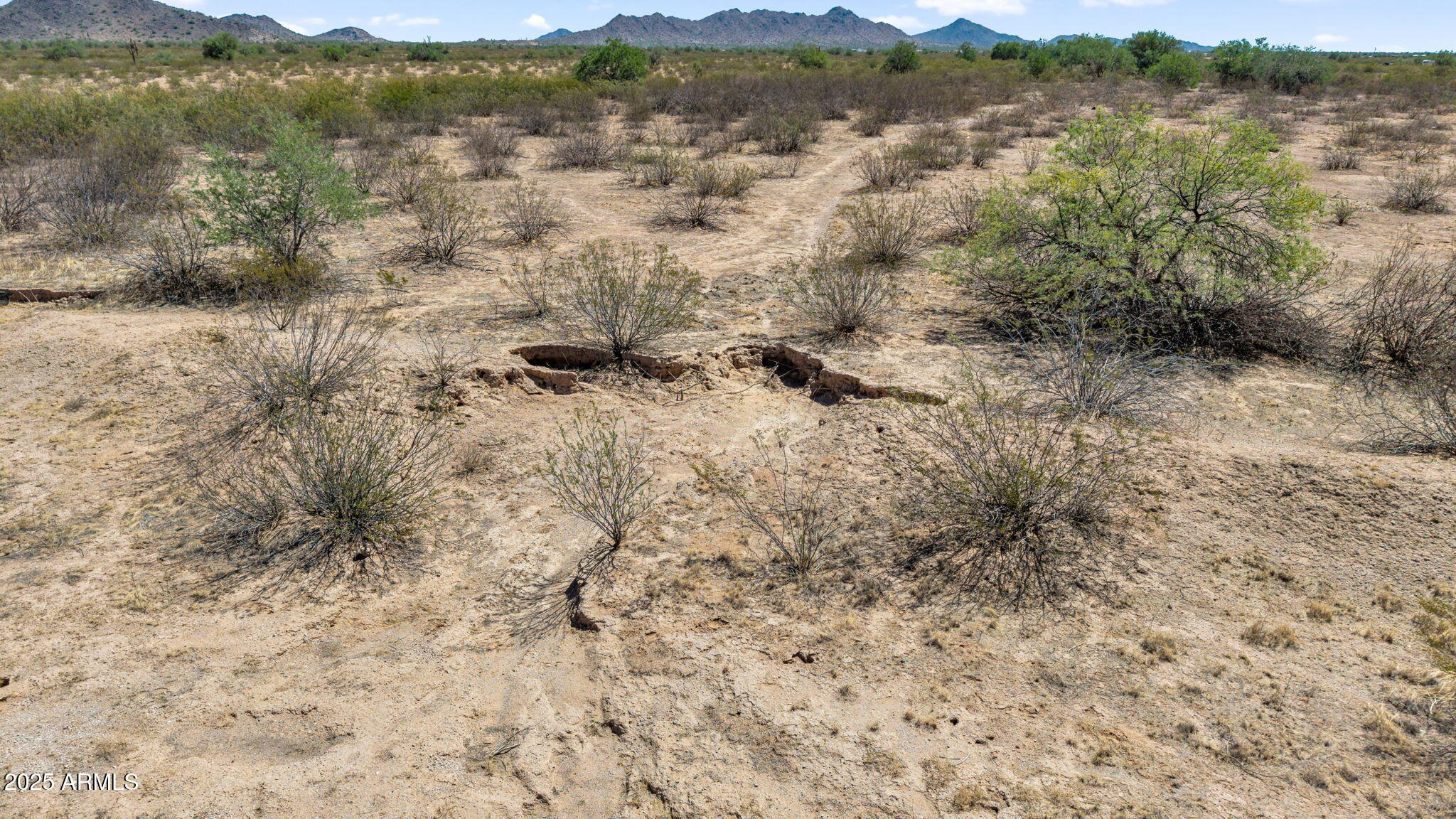 0 Peace Pipe Road, Unit 23 Maricopa, AZ 85138 - Photo 14 of 25 a view of lake with mountain