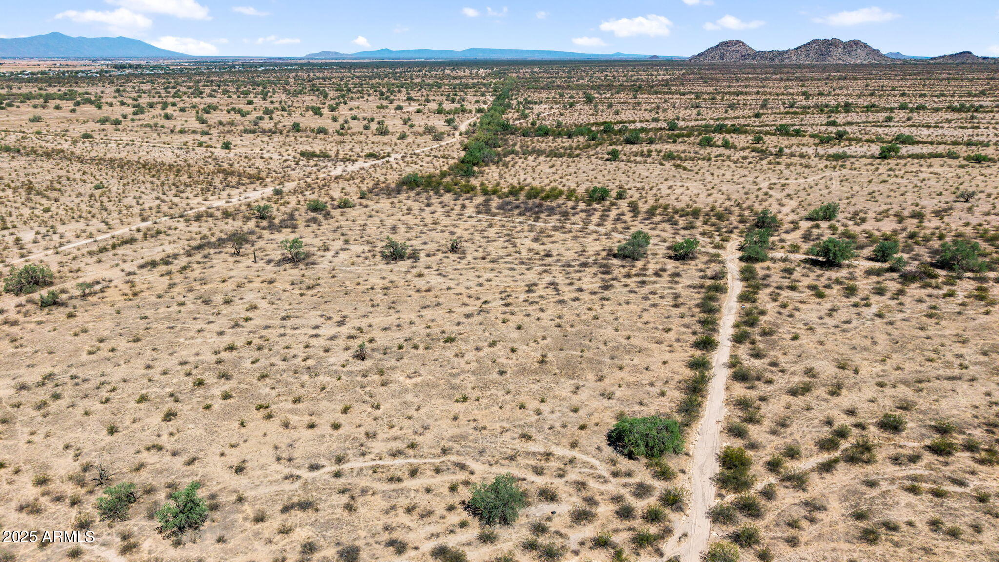 0 Peace Pipe Road, Unit 23 Maricopa, AZ 85138 - Photo 5 of 25 a view of a city with ocean view