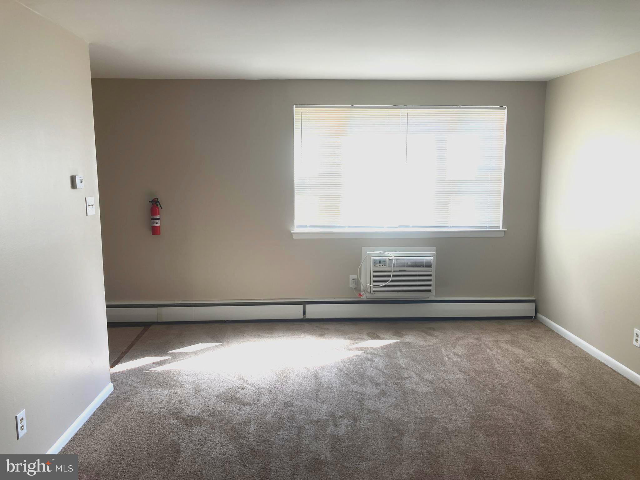 1600 Church Road, Unit A300 Wyncote, PA 19095 - Photo 4 of 16 Bright and inviting living space.