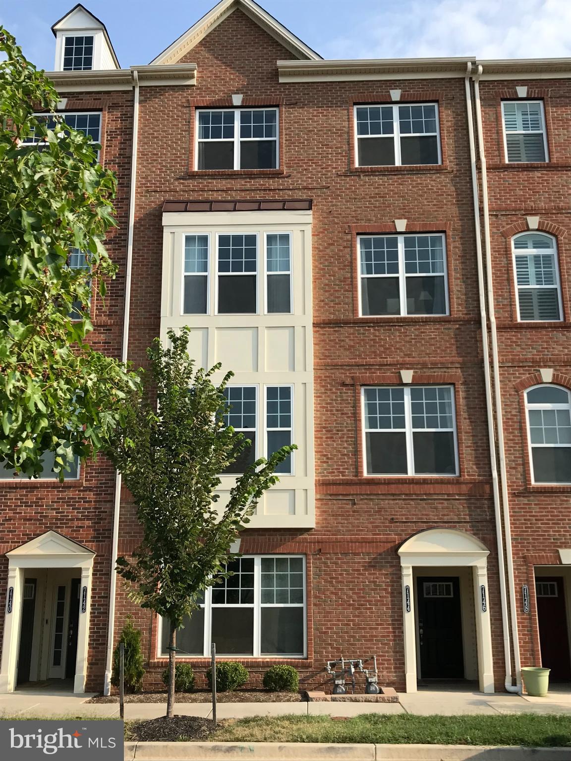 FRONT OF UNIT - UPPER 2 LEVELS - ELEVATOR IN UNIT