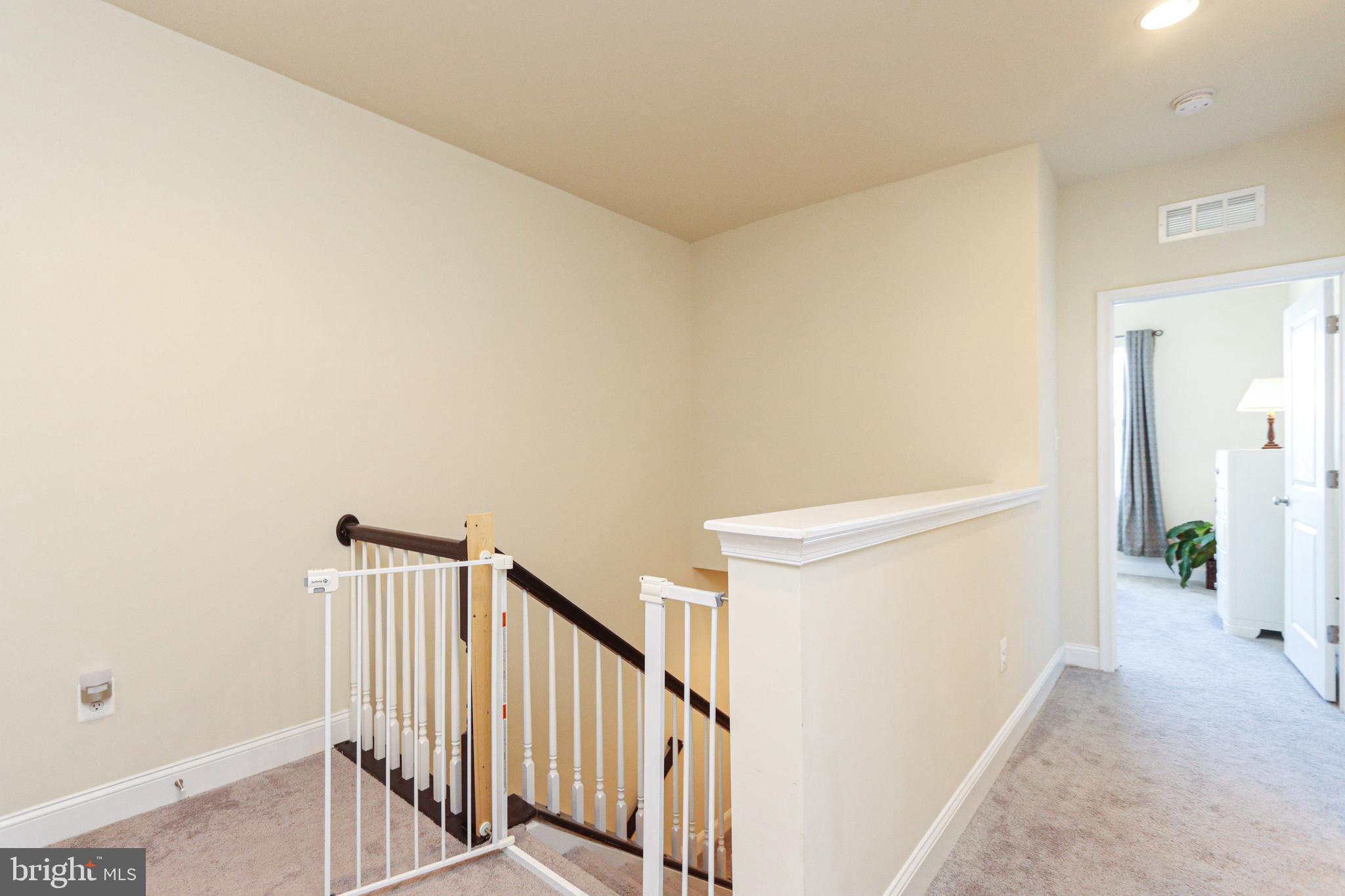 7146 Proclamation Place Frederick, MD 21703 - Photo 27 of 54 STAIRS TO UPPER LEVEL