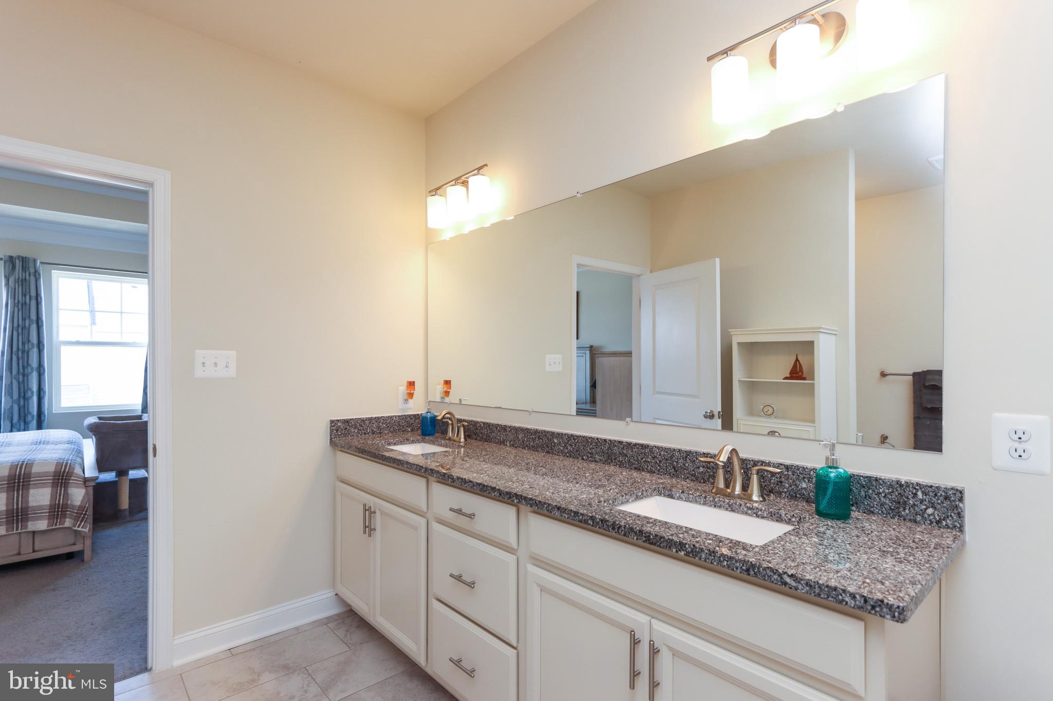 7146 Proclamation Place Frederick, MD 21703 - Photo 36 of 54 GRANITE COUNTERS - DUAL VANITY