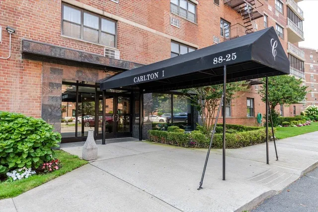 a view of a chairs and table in the patio