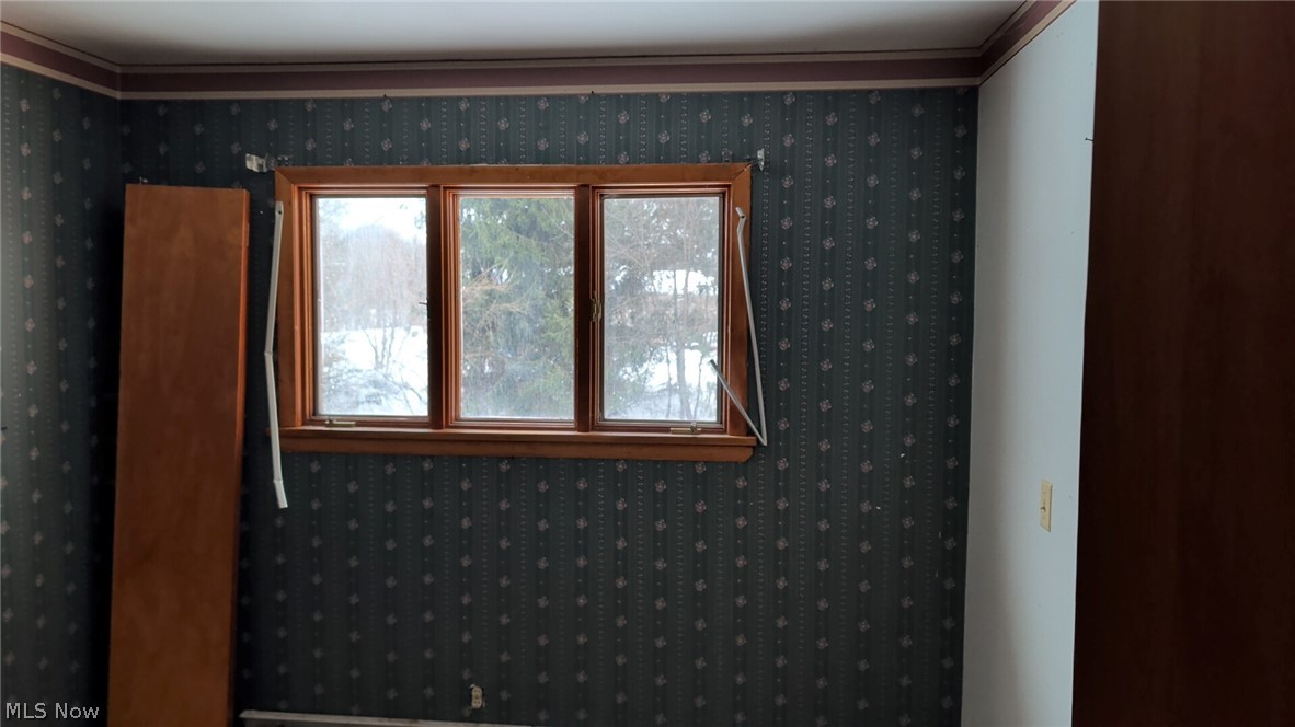 1078 Aberagg Road Atwater, OH 44201 - Photo 7 of 14 Empty room with wallpapered walls