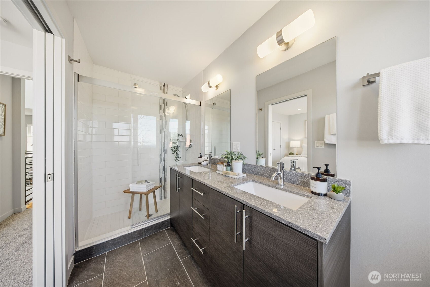 3010 63rd Avenue Southwest, Unit A Seattle, WA 98116 - Photo 20 of 38 a bathroom with a sink double vanity and a mirror