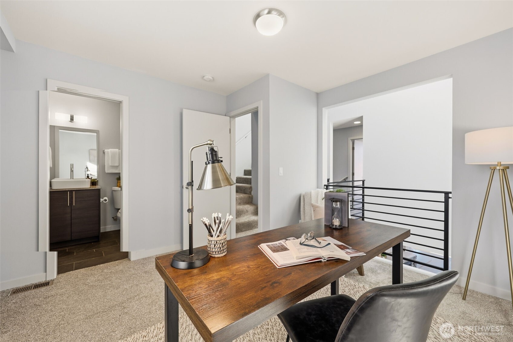 3010 63rd Avenue Southwest, Unit A Seattle, WA 98116 - Photo 24 of 38 a view of a workspace with furniture and bathroom