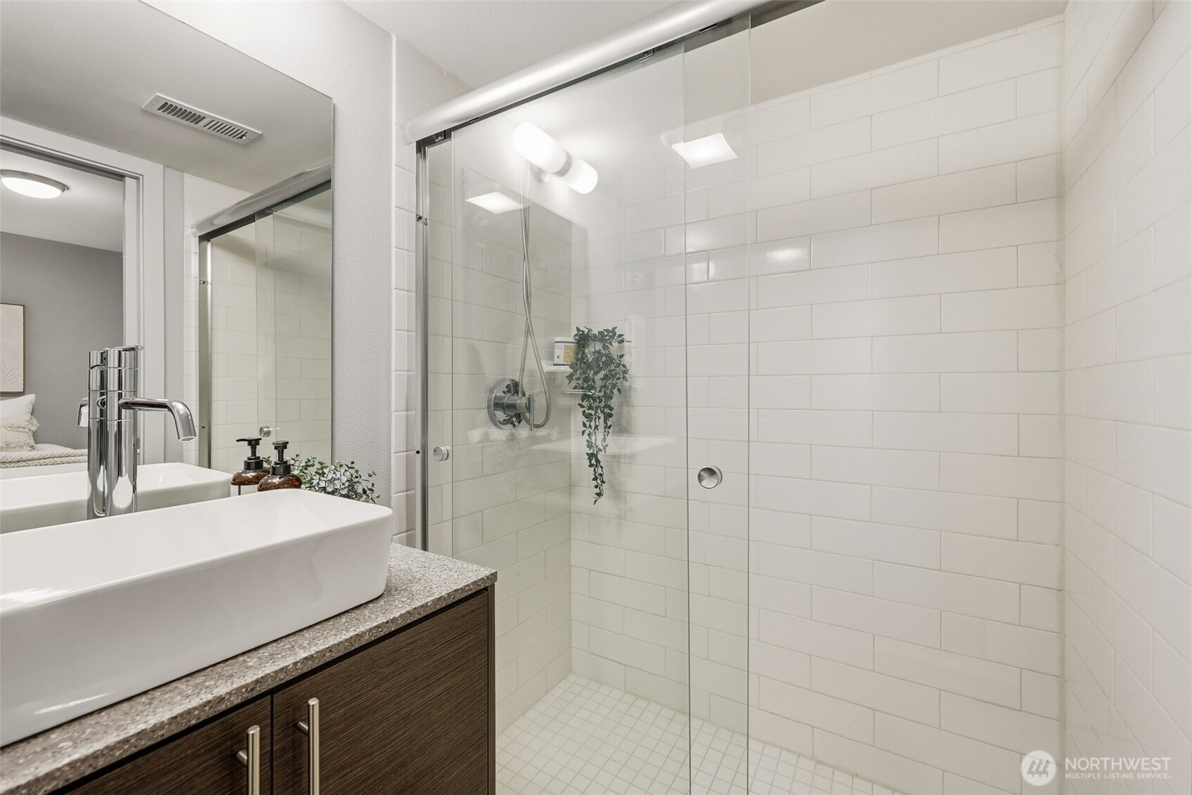 3010 63rd Avenue Southwest, Unit A Seattle, WA 98116 - Photo 28 of 38 a bathroom with a sink shower and a mirror
