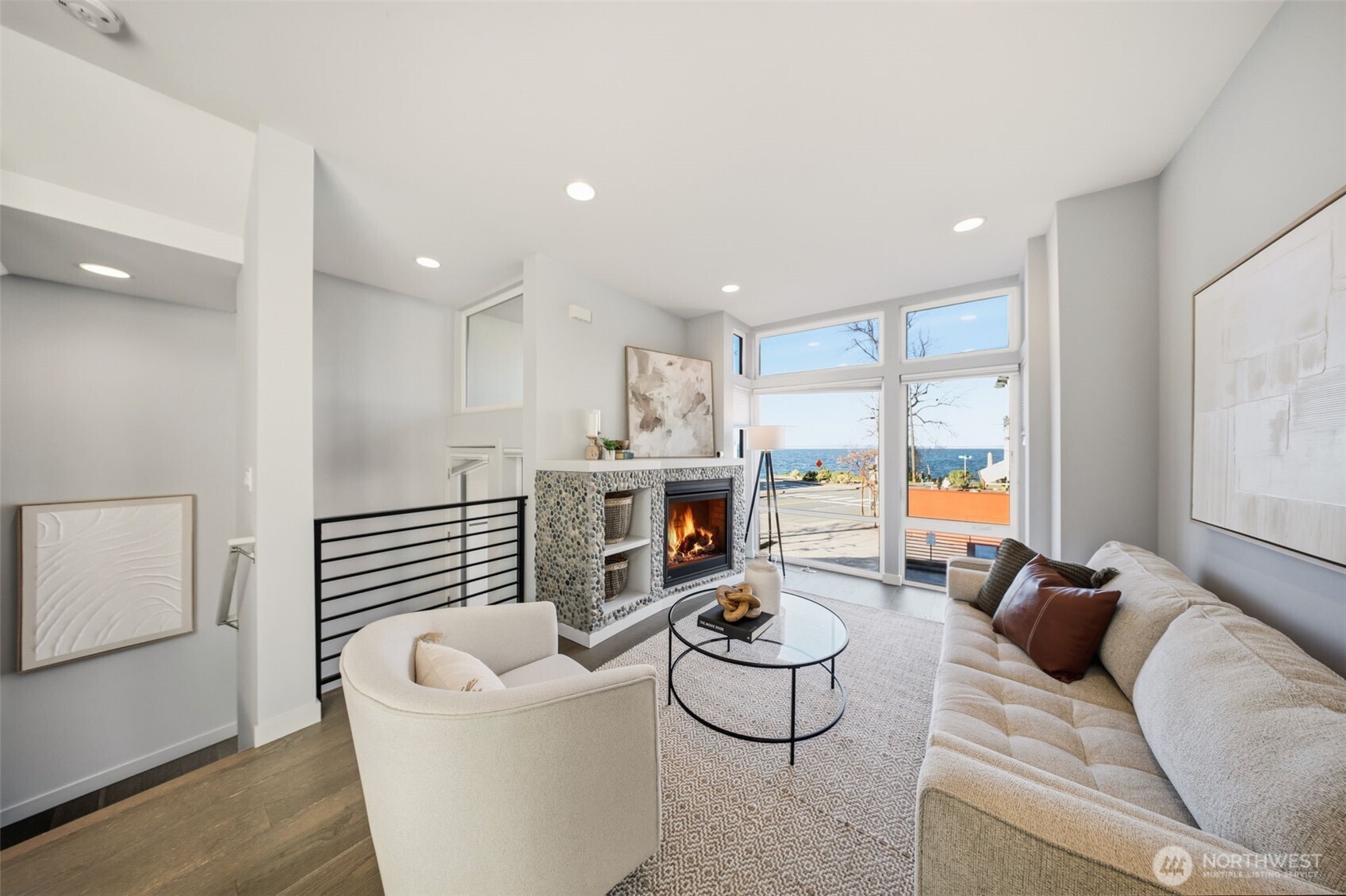 3010 63rd Avenue Southwest, Unit A Seattle, WA 98116 - Photo 3 of 38 a living room with furniture and a fireplace
