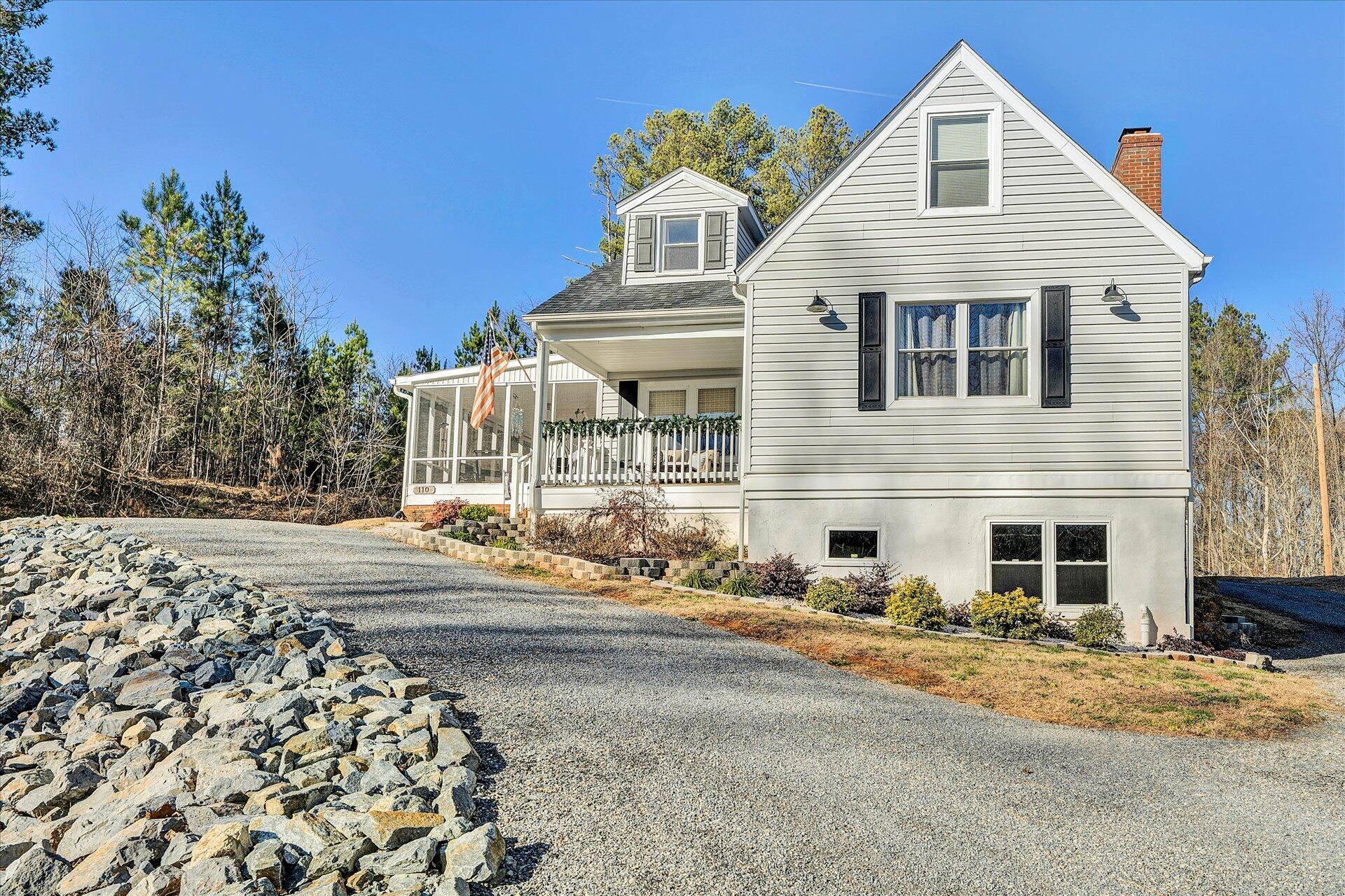 110 Nursery Road Boones Mill, VA 24065 - Photo 2 of 33 a front view of a house with a yard