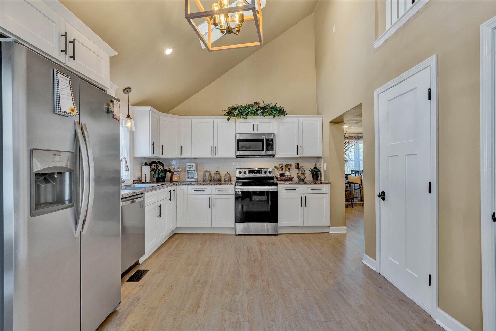 110 Nursery Road Boones Mill, VA 24065 - Photo 16 of 33 a kitchen with stainless steel appliances a refrigerator sink and microwave