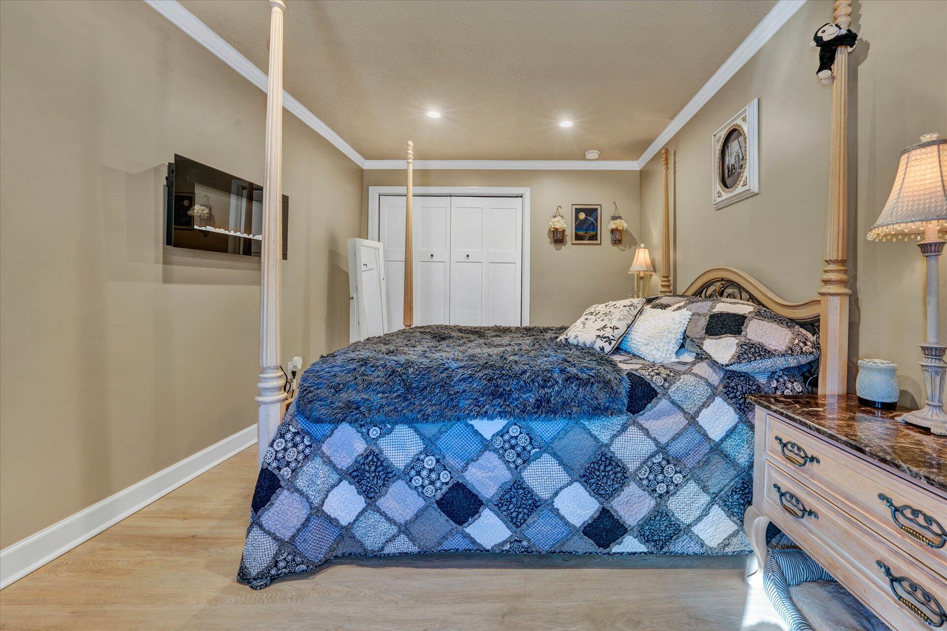 110 Nursery Road Boones Mill, VA 24065 - Photo 21 of 33 a bedroom with a bed and a flat screen tv