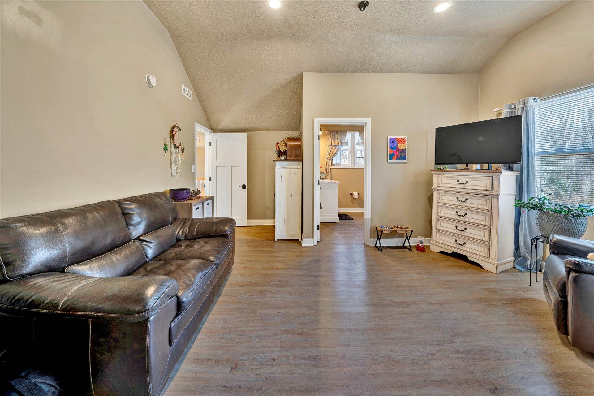 110 Nursery Road Boones Mill, VA 24065 - Photo 27 of 33 a living room with furniture and a flat screen tv