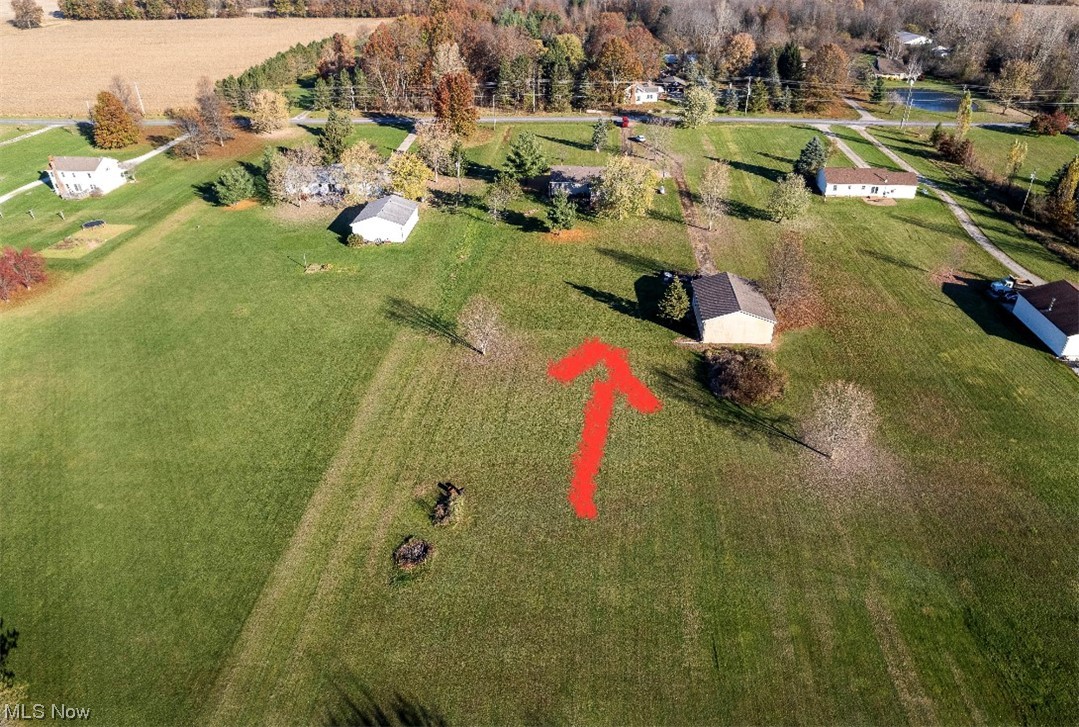 9066 Crow Road Litchfield, OH 44253 - Photo 11 of 28 Drone / aerial view featuring a rural view