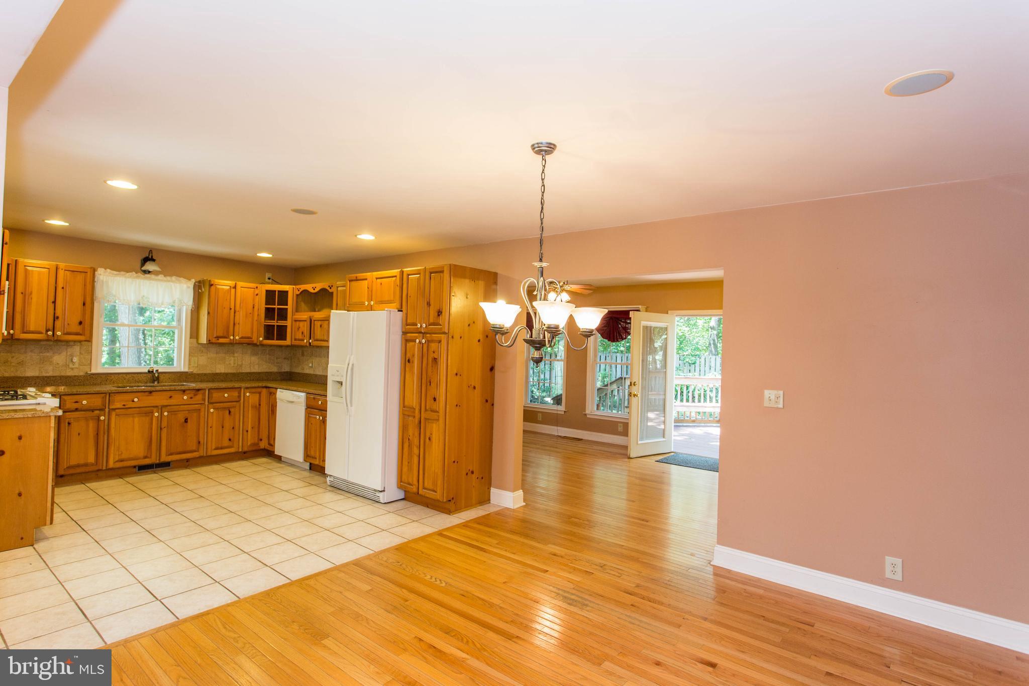 22175 Wilson Road Georgetown, DE 19947 - Photo 11 of 38 Dining room adjoins the kitchen