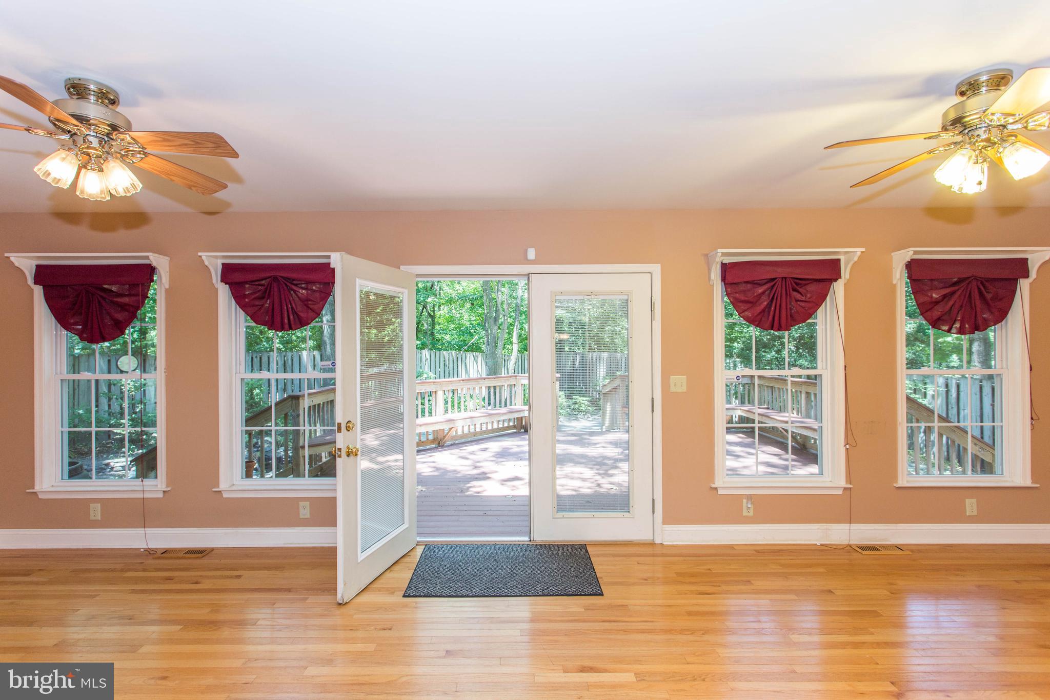 22175 Wilson Road Georgetown, DE 19947 - Photo 17 of 38 Spacious Family Room leads to your private oasis