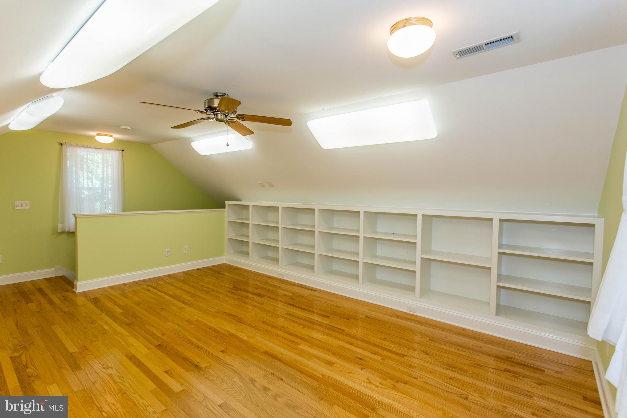 22175 Wilson Road Georgetown, DE 19947 - Photo 32 of 38 3rd floor office or studio with built in shelving