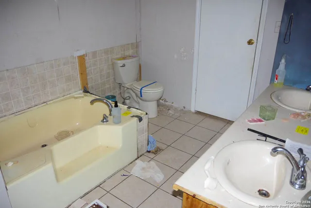 a bathroom with a sink and a toilet